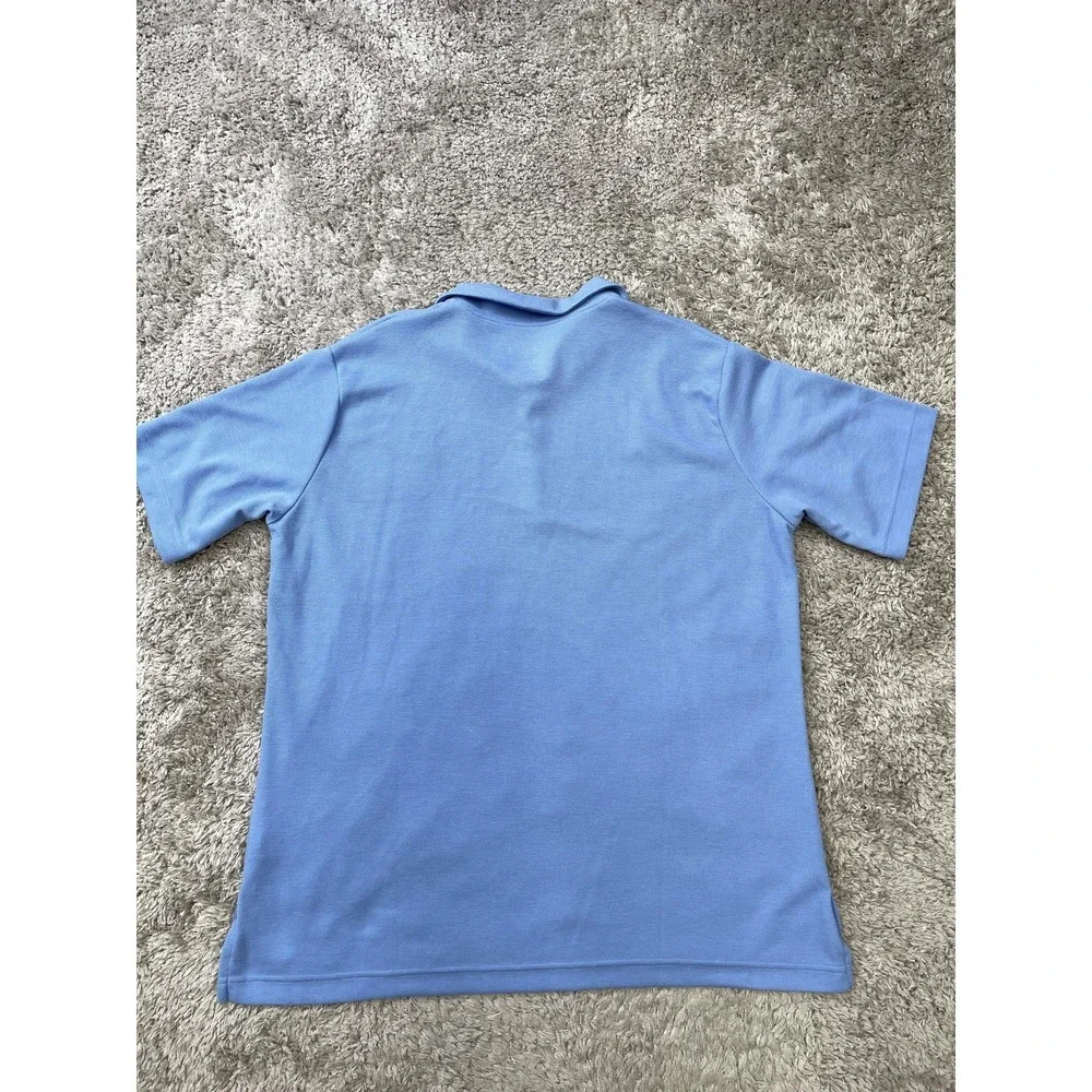 Jordan Men’s Polo Shirt in Carolina Blue with UNC Logo